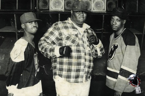 Miami bass artists Loc Ace and Vic in front of a club sound system in 1993