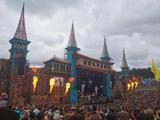 Opening ceremony stage and crowd at Boomtown in 2019