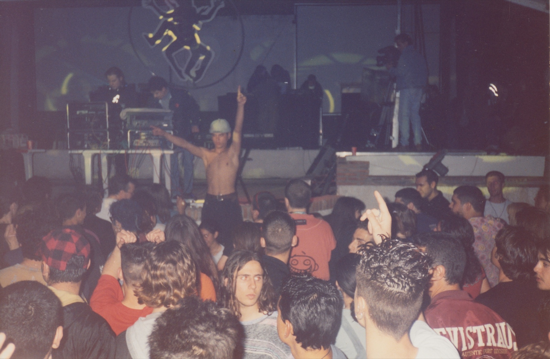 Crowd dancing at an archival Andalusian breakbeat rave