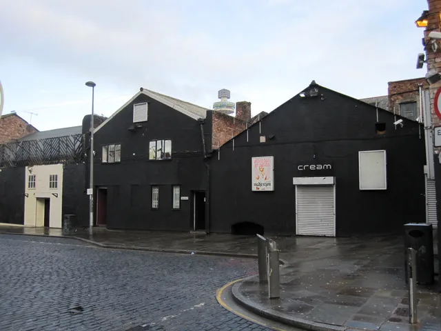 The black-painted Cream club buildings in Wolstenholme Square, Liverpool, with a Cream sign above a shuttered door