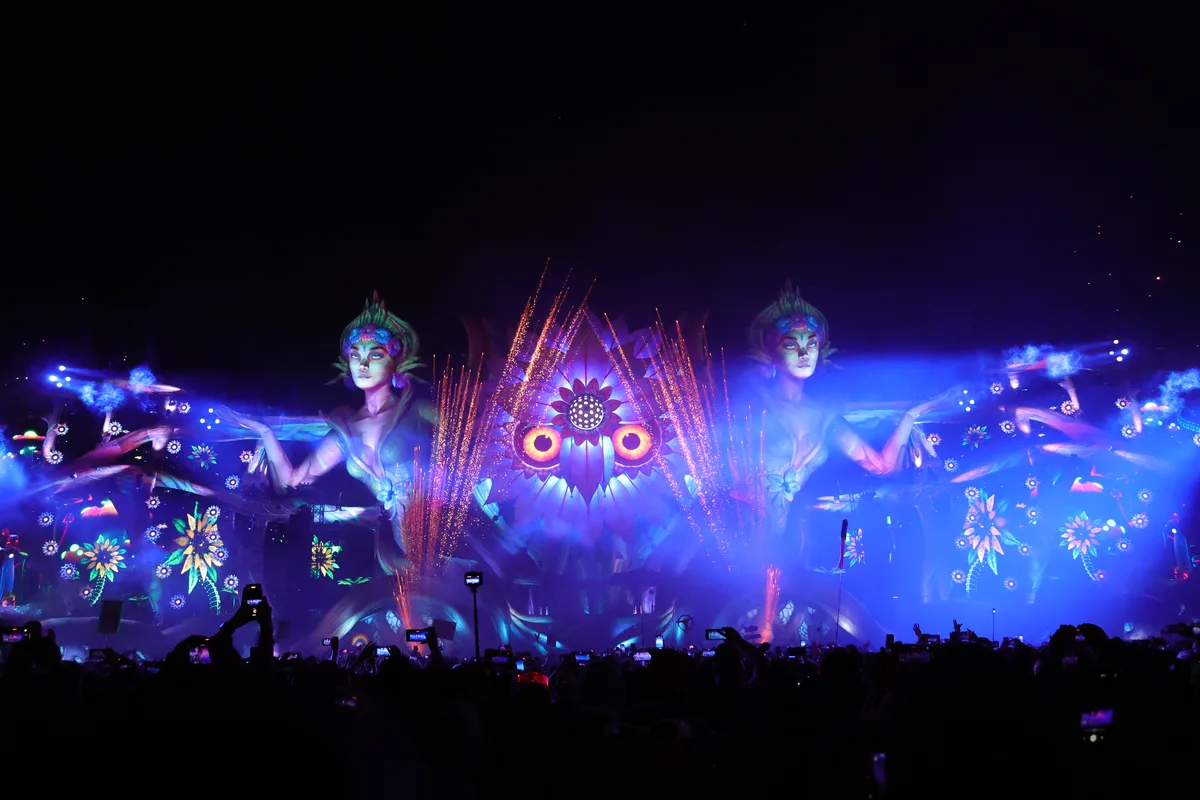 The main stage at EDC Mexico in 2023, a large themed stage above the crowd at the Mexico City racetrack