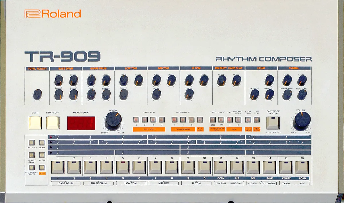 Front panel of a Roland TR-909 drum machine with its sixteen step buttons and tempo display