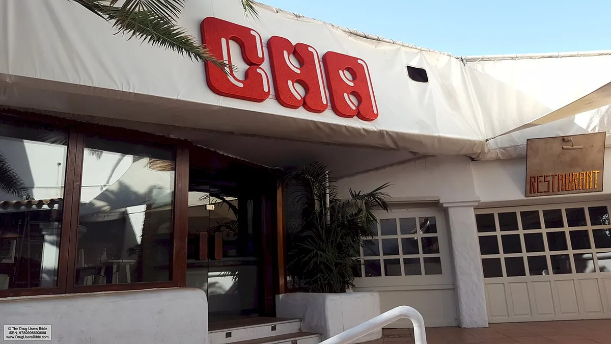 The white entrance of Pacha in Ibiza Town with its red lettering