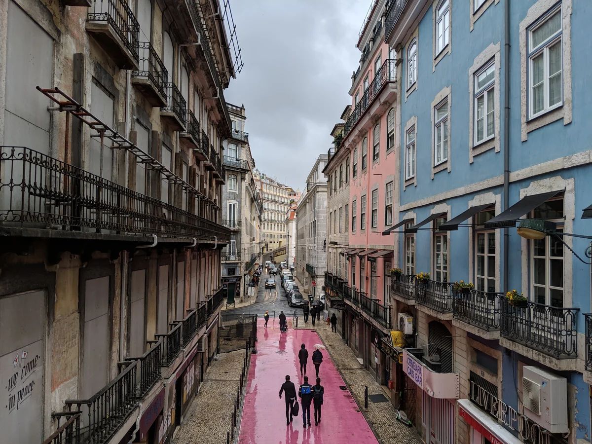 An aerial view of Rua Nova do Carvalho, Lisbon's pink-painted 'Pink Street'