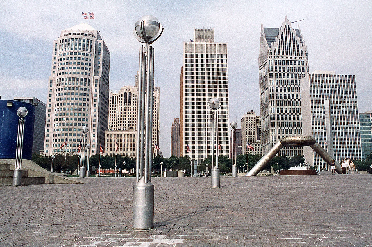 Hart Plaza beside the Detroit River, with downtown Detroit buildings behind the concrete plaza