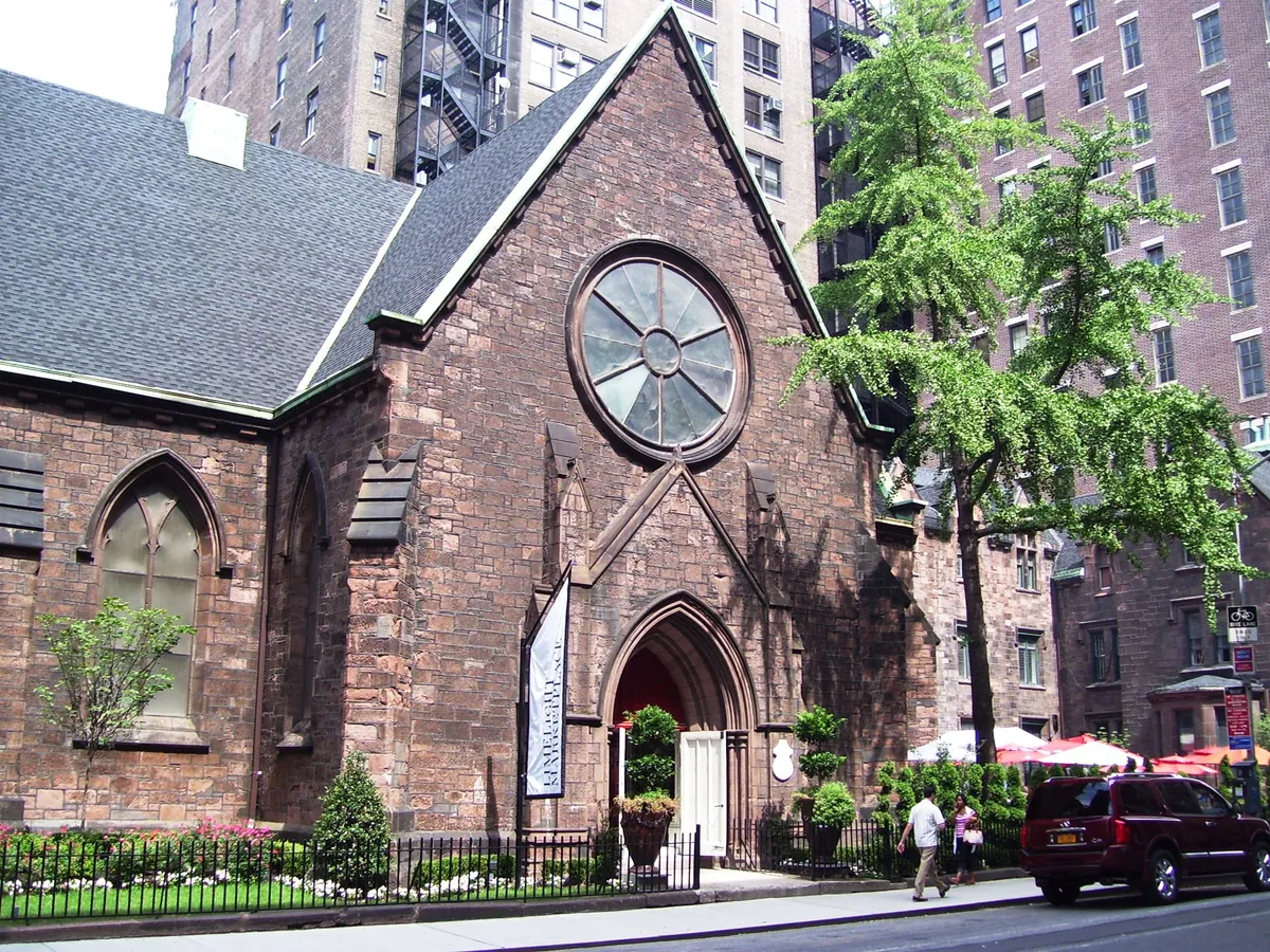 The brownstone Gothic Revival church at Sixth Avenue and West 20th Street, seen from the street