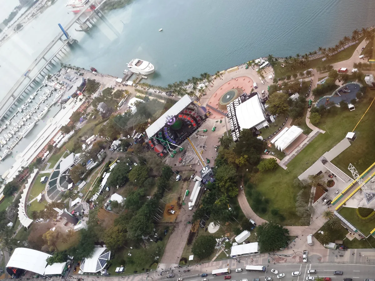 Bayfront Park in downtown Miami seen from above during Ultra 2014, the Main Stage and tents beside the marina and Biscayne Bay