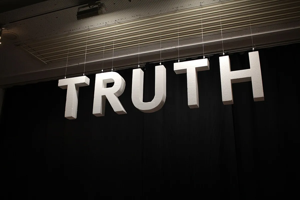 White letters spelling Truth hung over a black curtain at Elevate Festival 2019 in Graz